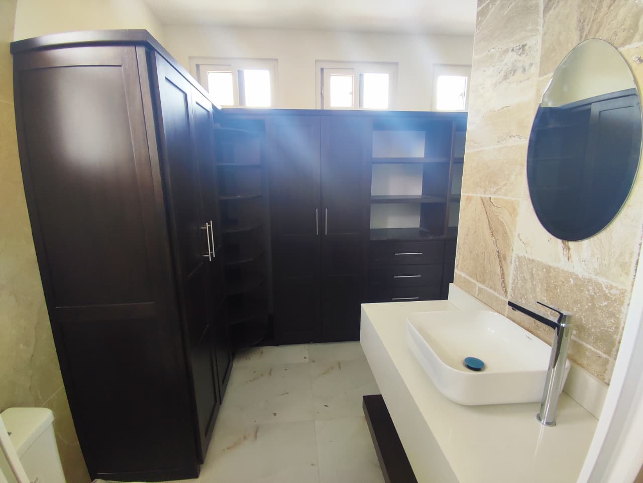 Custom bathroom and closet cabinets with built-in storage in Greater Victoria